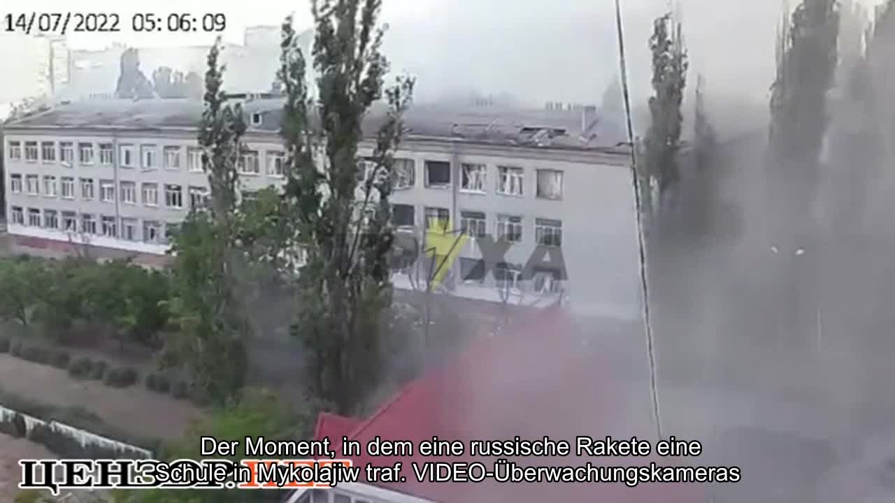 ️ The moment a Russian rocket hit a school in Mykolaiv. VIDEO surveillance cameras