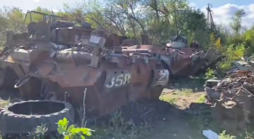 Izymsky, Kharkov region, Ukrainian troops show footage of a Russian vehicle cemetery.