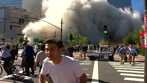 NIST FOIA 09-42- R25 -- 42A0121 - G25D32, Video -1 (WTC2 Debris, 9-59am-WTC1 104th Floor Fire)