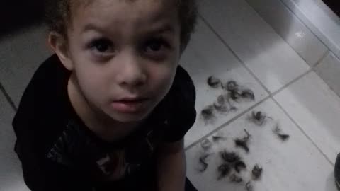 Kid Gives Himself a Haircut