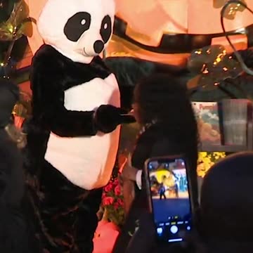 A SUPER excited Joe Biden & Jill Biden dressed as a Panda Bear hand out Halloween candy