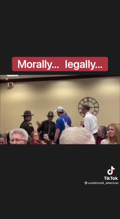 Salt Lake City arrested a man for wearing a patriotic shirt at a school board meeting.