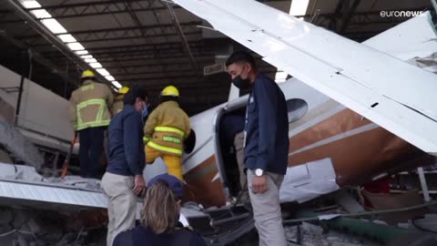 Three dead after small plane crashes through supermarket wall in Mexico