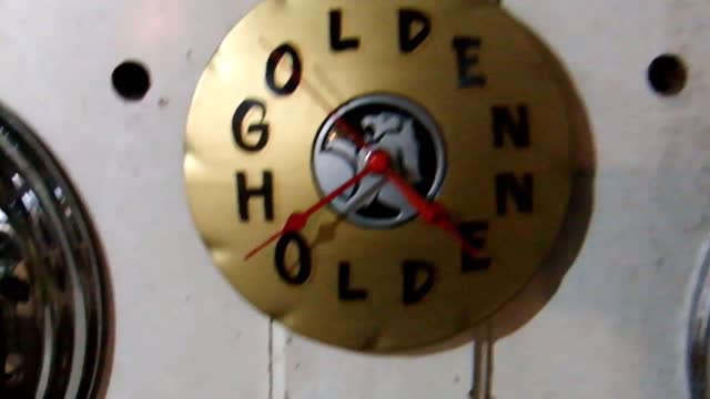 Golden Holden Custom Hubcap Wall Clock