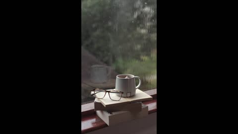 A cup of coffee in a rainy day