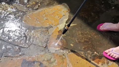 Adding weathering to our patio rocks