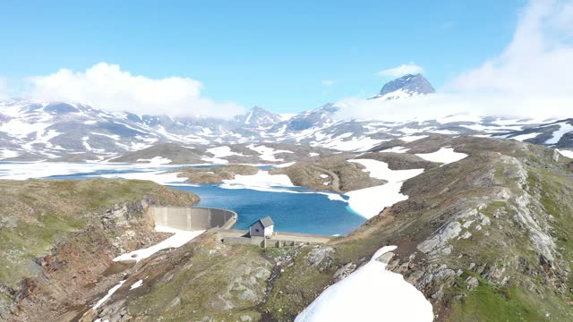 Flying Towards A Dam in The Snowy Mountains