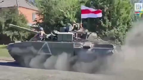 Belarusian Volunteers Seen Driving Through Russian Settlement in Kursk