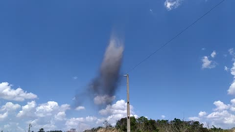 Tornado of Soot Swirls Into the Sky