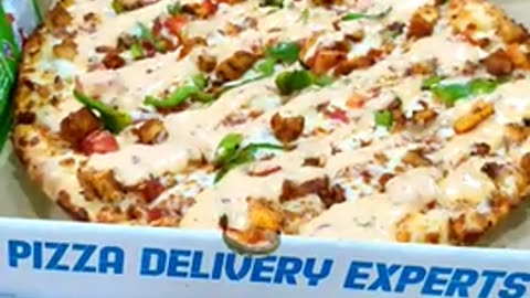 Ymmmmmm, it,s yummy pizza in Pakistan