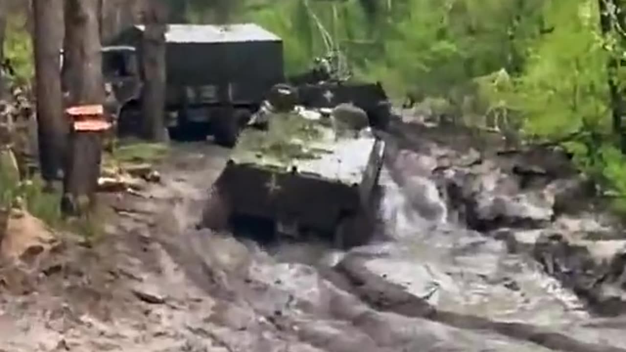 Ukrainian equipment near Kremenna. In some places the mud almost reaches the cab of the trucks.