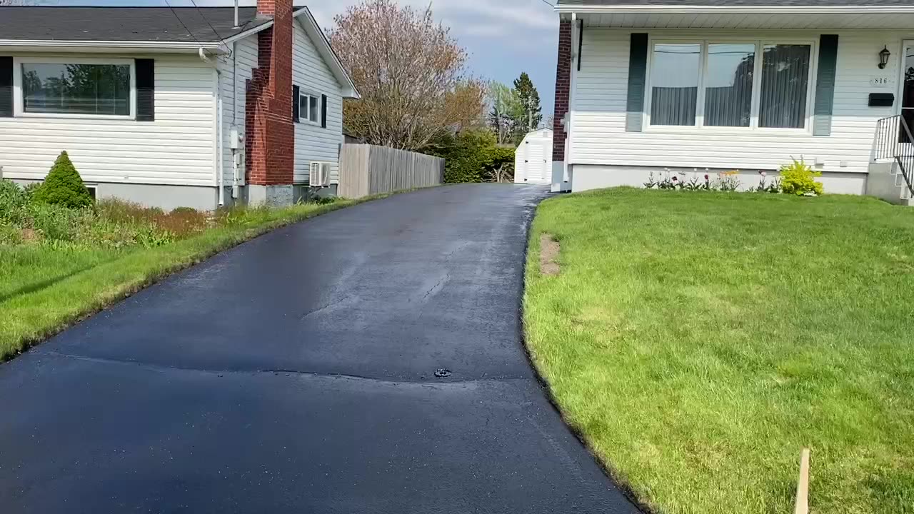 Professional Asphalt Spray Sealing: “The Yet Another Breezy One” Top Coats Pavement Maintenance