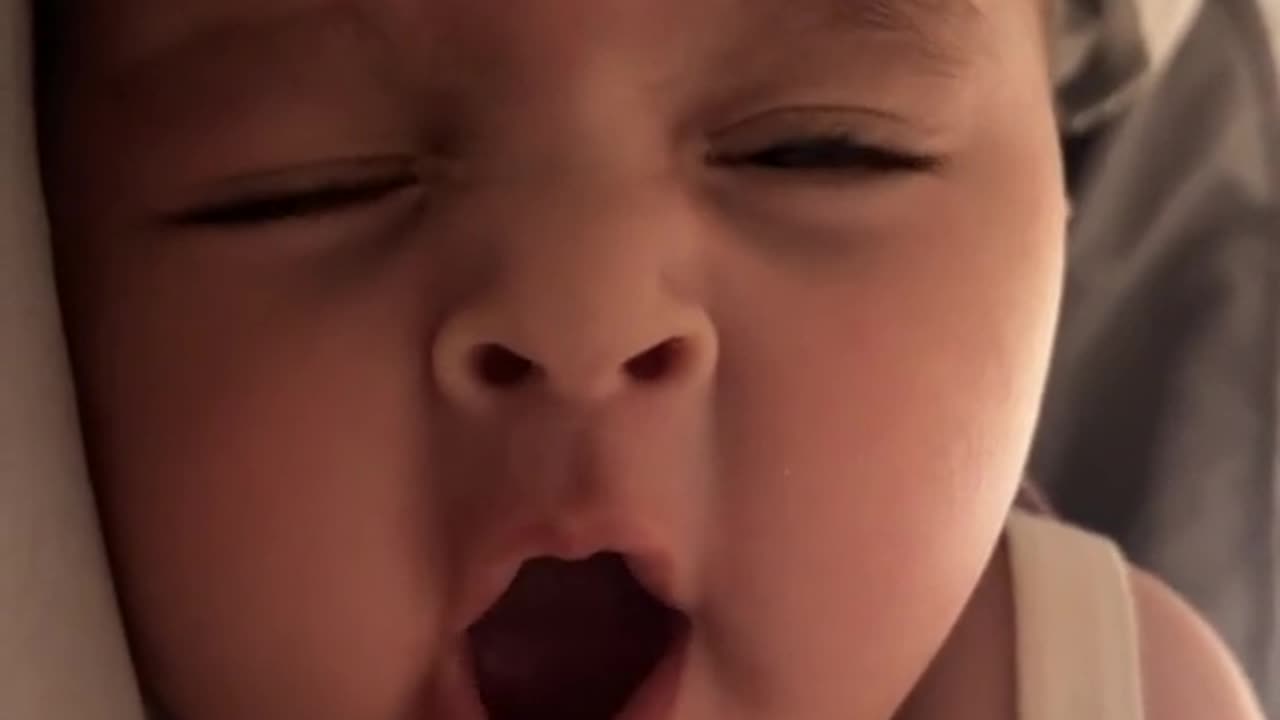 "Adorable Baby Yawning - You Won't Be Able to Resist Smiling!"