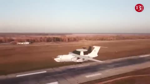 Russian vehicles hit by Ukrainian drones burn on the roadside - image taken by the Russian military