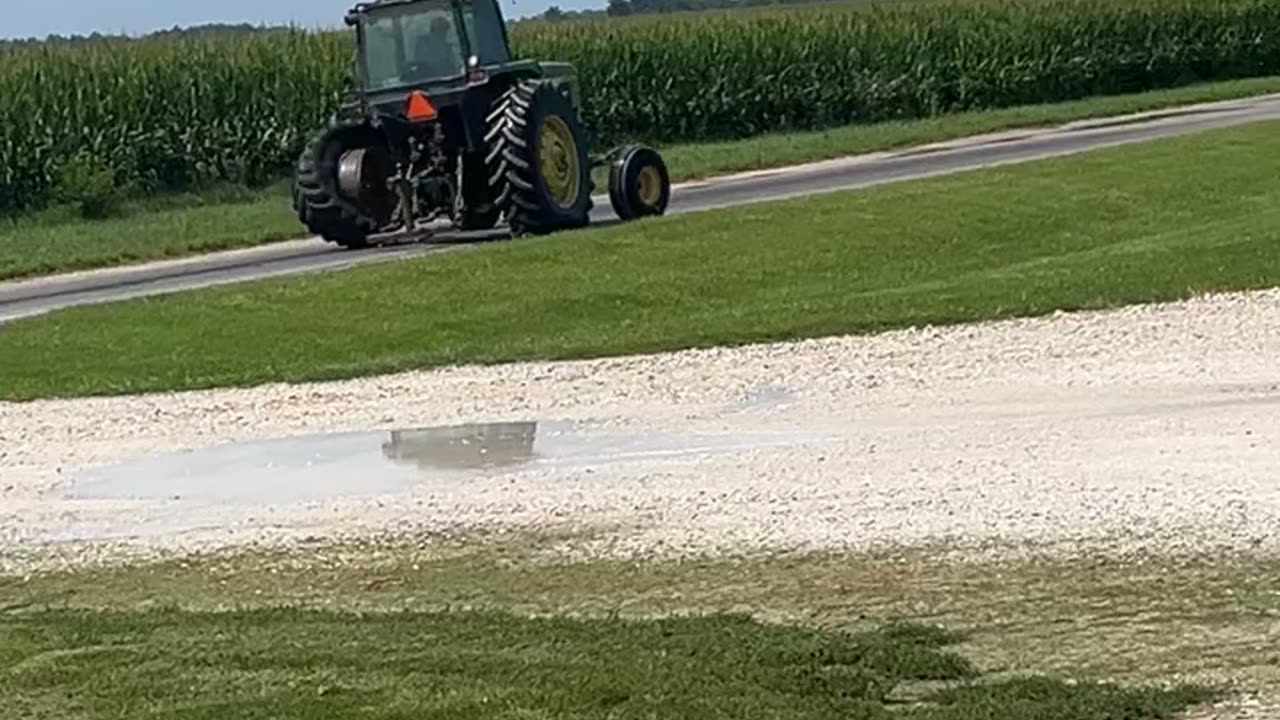 John Deere Tractor Drives on Flat Tire