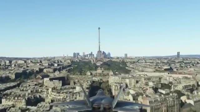 F-22 FLIES UNDER THEEIFFEL TOWER