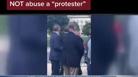 Congressman Higgins removing a protester