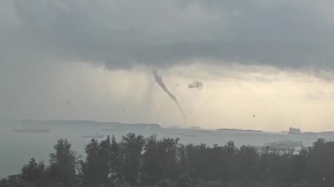 Waterspout Rising In Singapore During A Thunderstorm