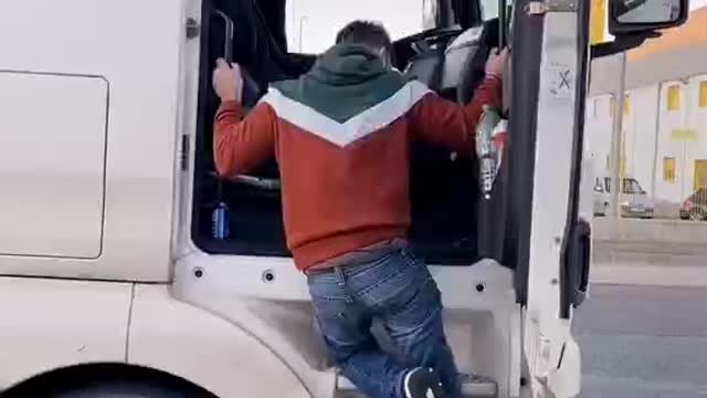 Young man trying to get on