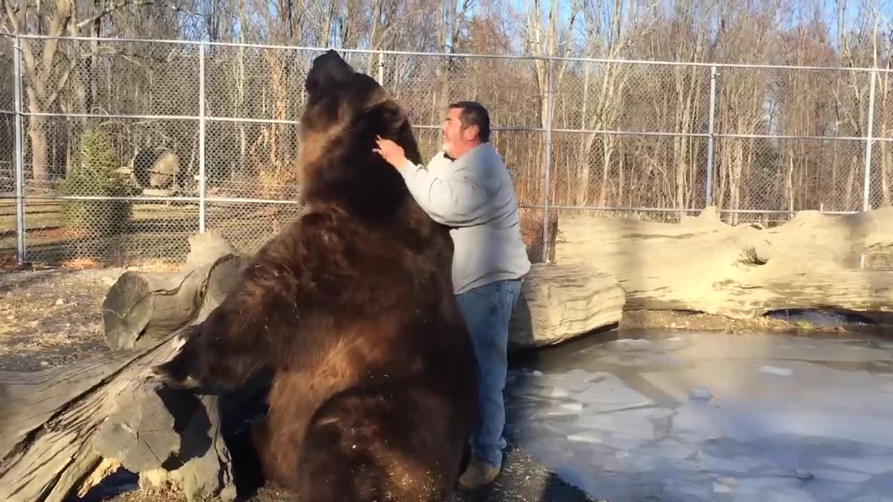 Jim playing with Jimbo the bear.