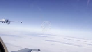 A Russian fighter jet smashes a US unmanned aircraft