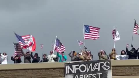 Protesters Crowd On Top of an Overpass to Support the Truck Drivers Heading to Washington, D.C.