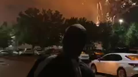 Fireworks make car alarms sound while my friends dad watches blissfully