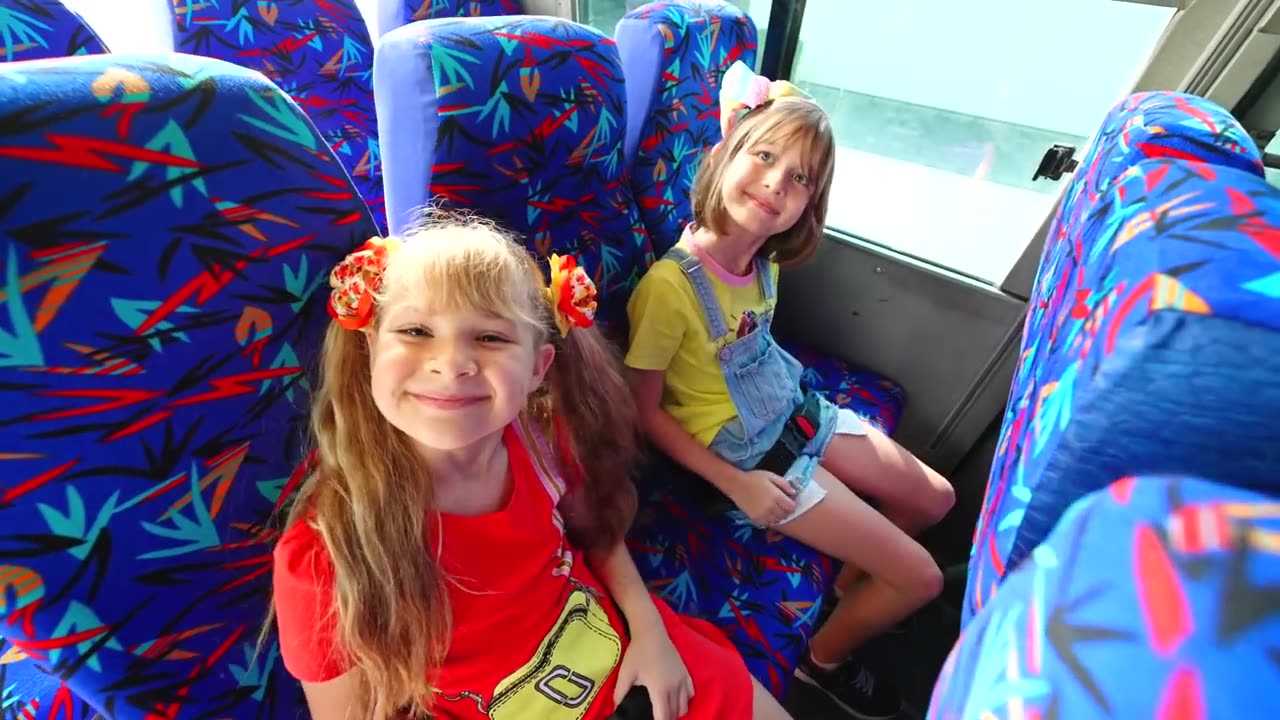 Diana and Roma teach School bus rules with friends