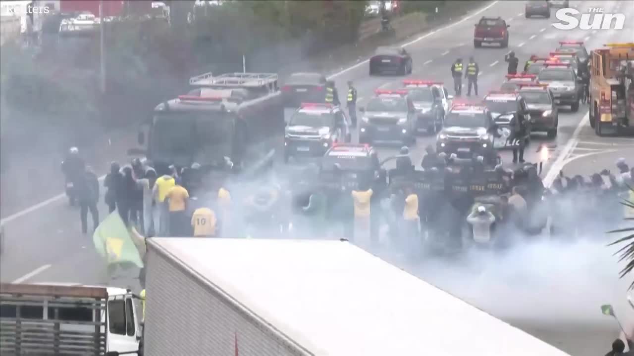 Brazilian police fire water cannons and rubber bullets at anti Lula protesters