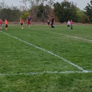 BradKuz76 Tommy "playing" flag football with Parker 2023