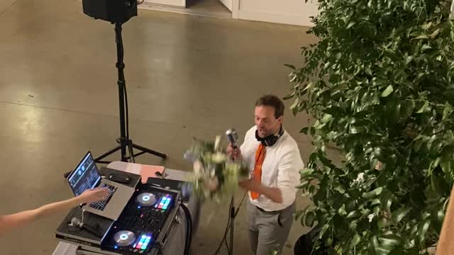 DJ Catches Bride's Bouquet Twice