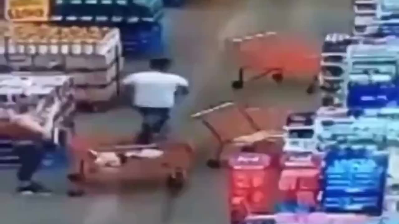 Dumb Woman Keeps Ramming Her Cart Into Man Until