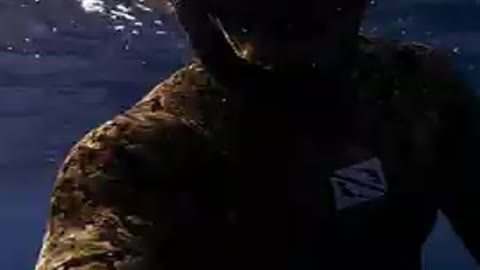 Diver Puts Egg in Bubble Ring