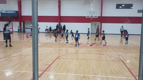 Grandson Blaise's first basketball game. Maroon #3