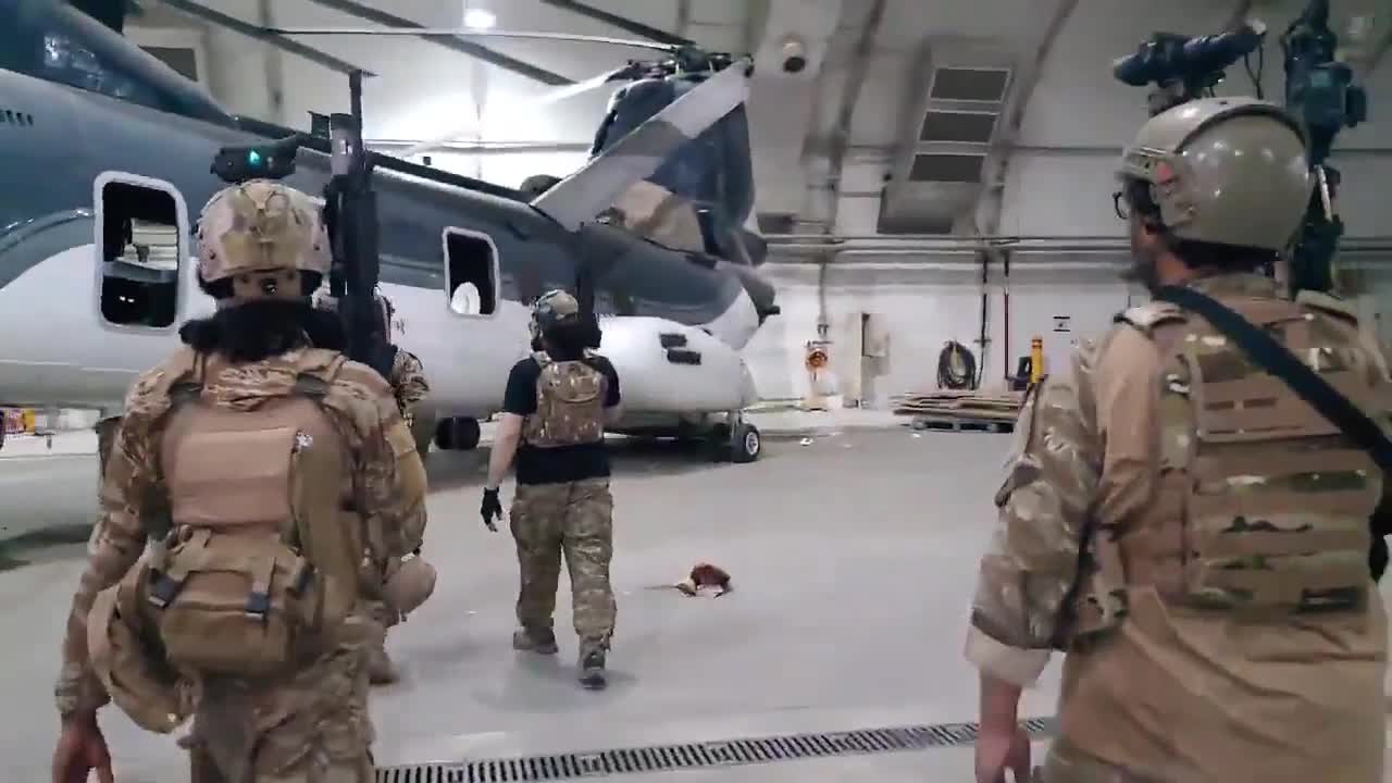 Taliban fighters enter Hangar in Kabul Airport with chinook helicopters after US leaves Afghanistan