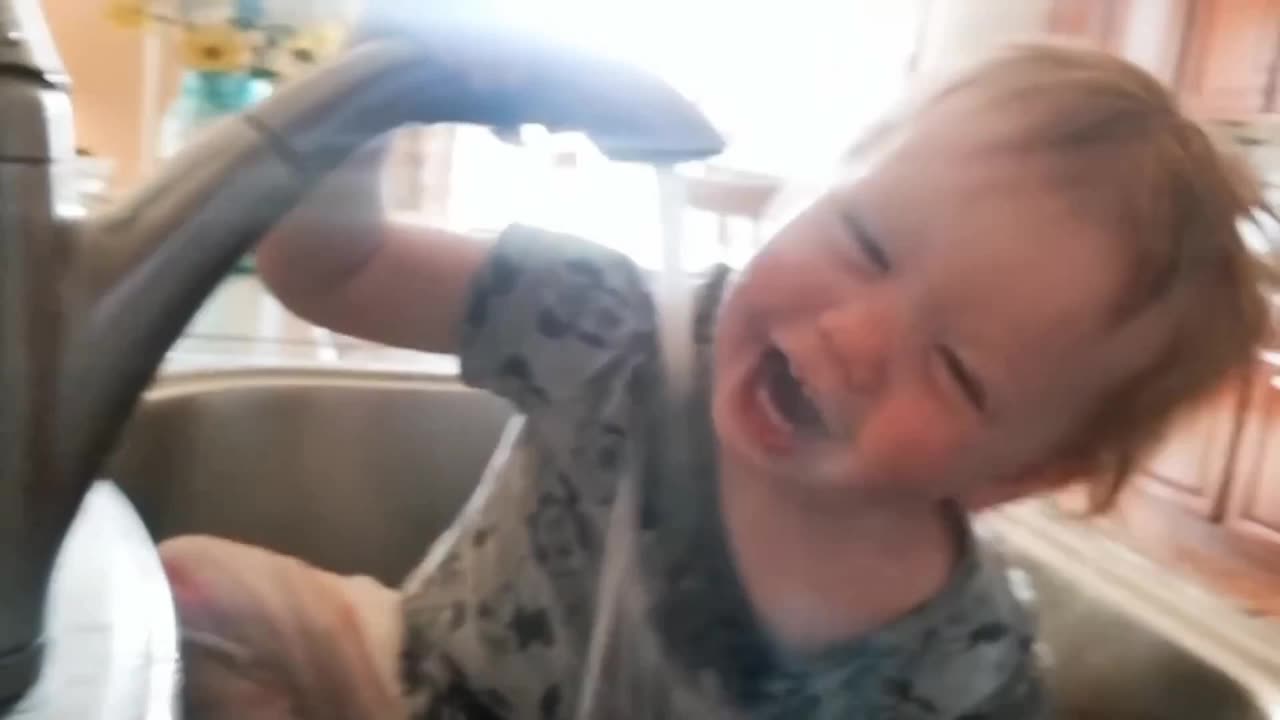 cute baby finds water and drinks