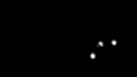 Triangle-shaped UFO Spotted hovering over Mid-Coast Maine.