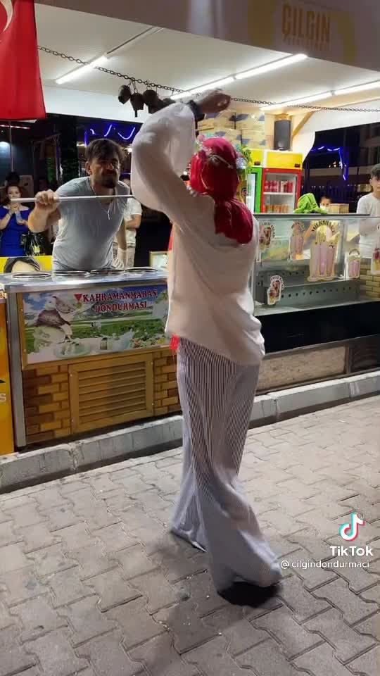 dance to attract customers into the shop