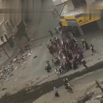 DF SNIPER MURDERS PALESTINIAN LADY holding hand of her white flag-waving child