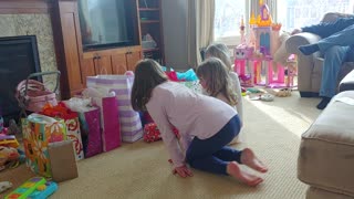 Layla opening presents on 5th birthday.