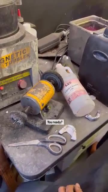 Guy gets hair stuck in a grinder.