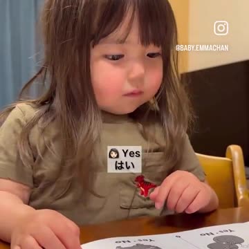 Japanese girl learning English gets the giggles