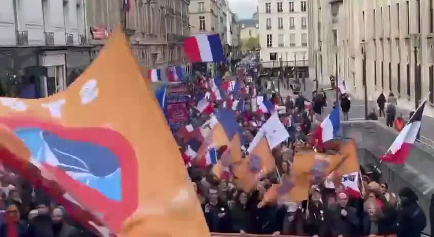 A protest in Paris calling for their removal from NATO and neutrality.