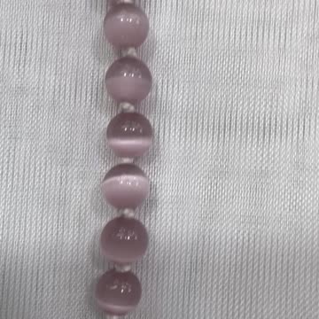 Handmade + Knotting Unique Necklace with Cat Eye Beads, Crystal Peace Sign