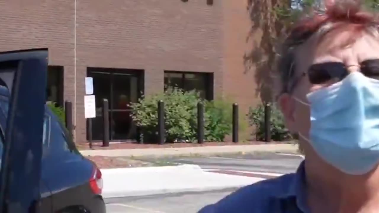 CRAZY PURPLE HAIR KAREN WEARING A MASK WHILE DRIVING, TRIES TO RUN A GUY OVER FOR FILMING IN PUBLIC!