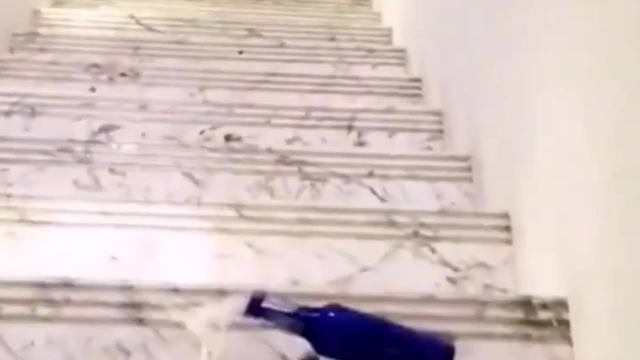 Bottle rolling on stairs #shorts #satisfying