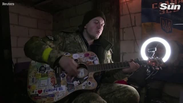 Ukrainian soldiers celebrate New Year in trenches of eastern frontline