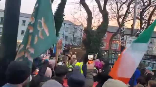 Irish Crowd Saves Woman From Being Arrested For Holding A Sign