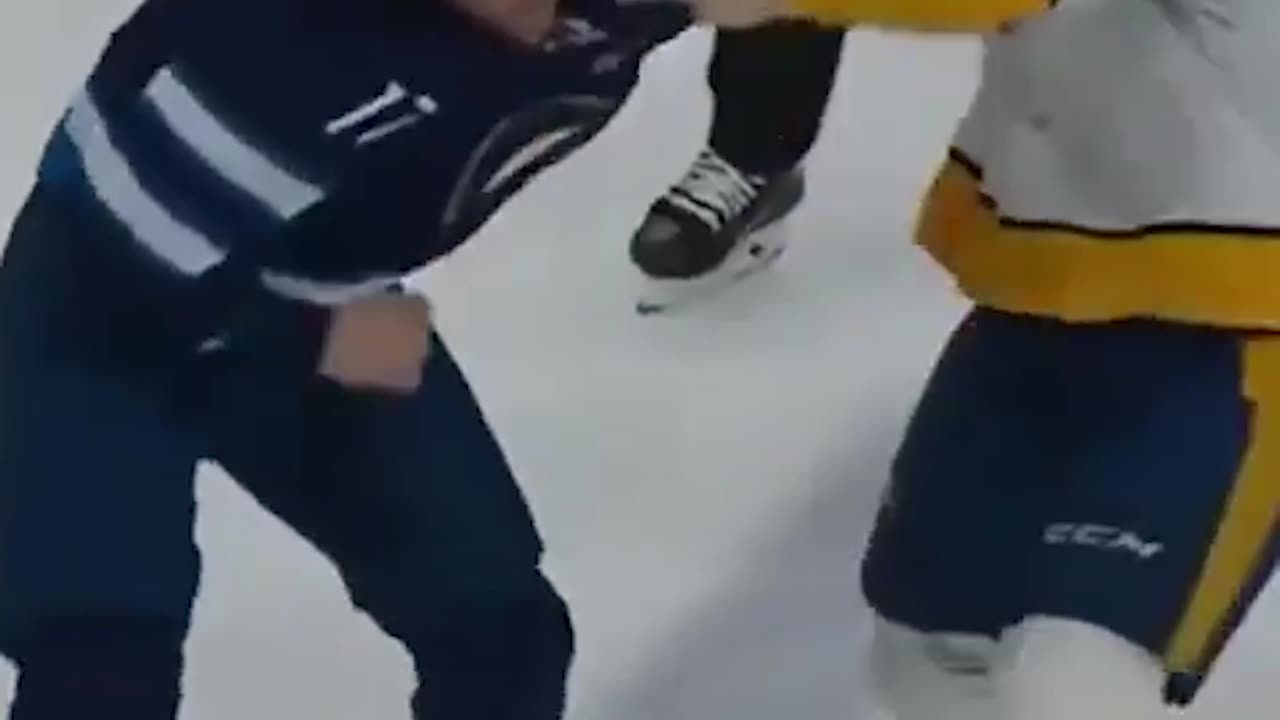 Adam Lowry and Tanner Jeannot hockey Square up - Nashville Predators vs Winnipeg Jets '22