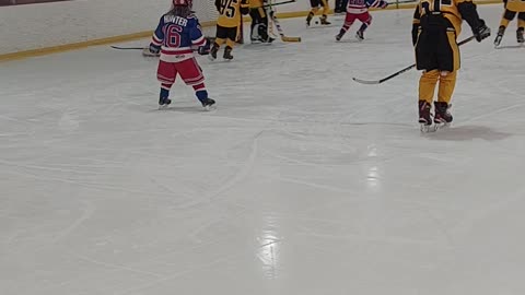 Pens Elite vs Chicago Hawks action